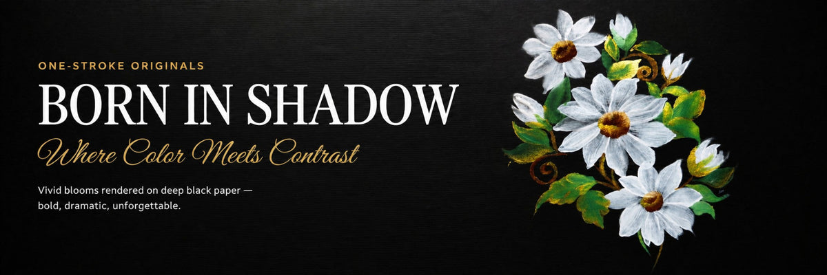 Born in Shadow collection banner with striking white florals on black background
